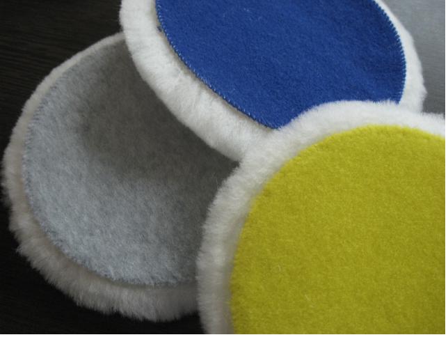 Stack of colour-coded felt polishing pads